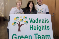 State Senator Heather Gustafson visits the Green Team table at an event